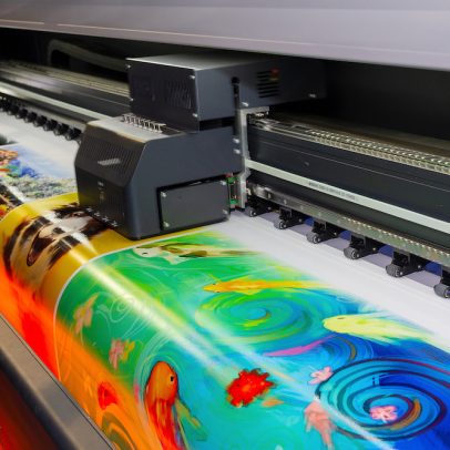 Large format printing machine in operation. Industry